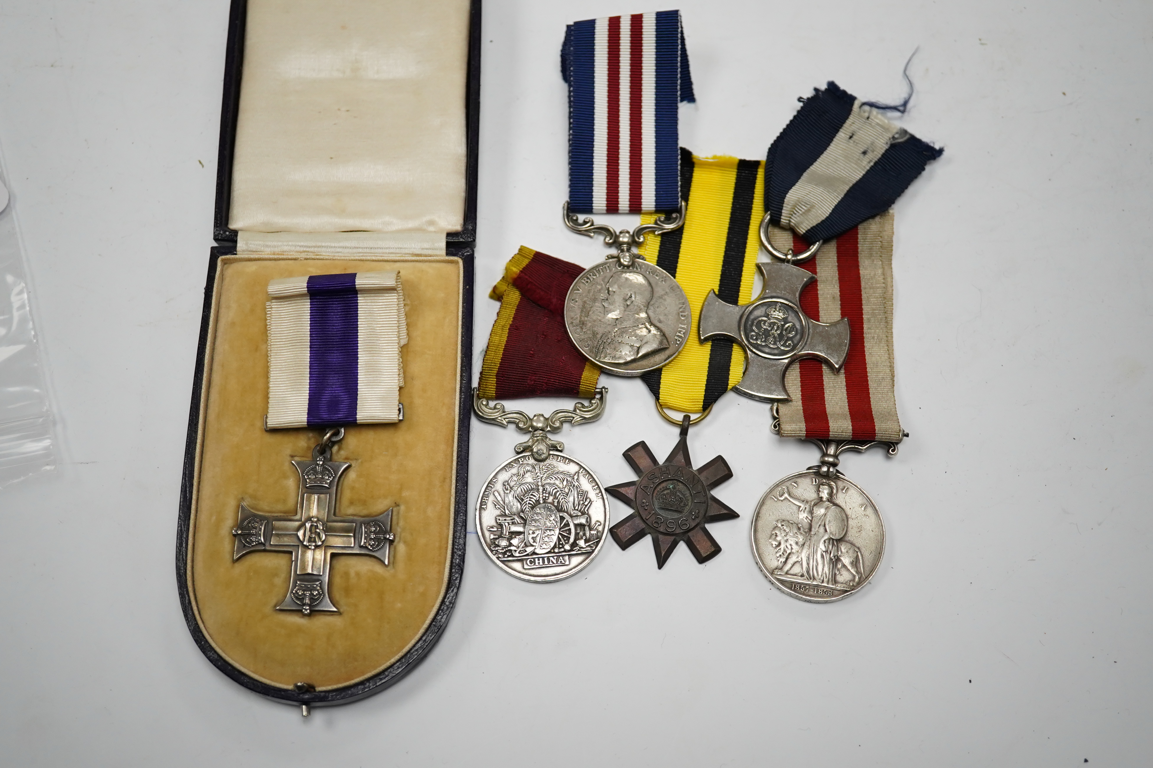 Six replica military medals, including